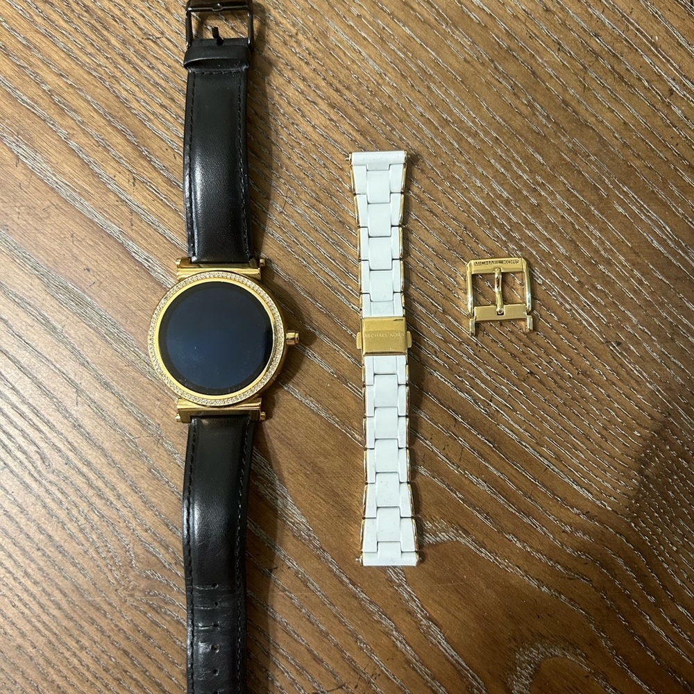 Michael Kors Smart Watch✨Worn a handful of times. Brand new comes with charger.